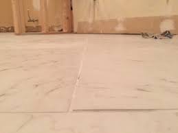 Once the old tiles are removed, the new. Is This A Bad Tile Install Any Hope Of Fixing