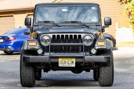 Image result for Brilliant Black 2003 Jeep