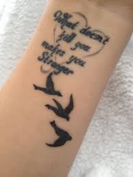 What Doesn T Kill You Makes You Stronger Tattoo With 3 Birds Strong Tattoos Tattoos Feather Tattoos