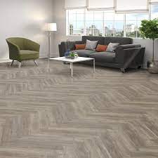 It usually has an attached cork backing for some extra cushioning and insulation. Lifeproof Biscayne Oak 4 72 In W X 28 35 In L Herringbone Luxury Vinyl Plank Flooring 22 31 Sq Ft Case I124513l The Home Depot Luxury Vinyl Plank Flooring Vinyl Plank Flooring Luxury Vinyl Plank