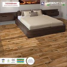 Our range of tiles is a winning choice for your bedroom space. Orient Bell Wooden Tiles Http Www Orientbell Com Digital Tiles Php Wall Tiles Tiles Designs Kitchen Wall Tiles