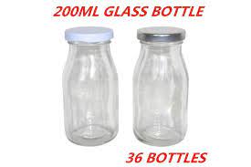 Put breastmilk in clean bottles or milk storage bags. 36 X Mini Small Glass Milk Juice Candy Bottle 200ml With Screw Top Silver White Lid W Matt Blatt