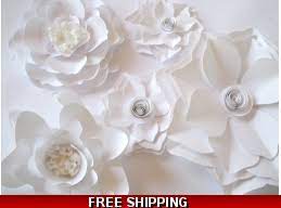 Tend to your walls with the same care you give your plants while filling your home with blooming delight! White Paper Flowers Big Paper Flowers Nursery Flowers Flower Wall Decor Wall Paper Flowers Paper Wedding