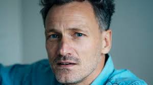 Arne Hain gets animated about his YDA win