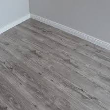 This Range Has A High Shine Gloss Finish And Will Compliment Any Home Decor Scheme In This On Tr Grey Laminate Flooring Grey Flooring Wooden Floors Living Room