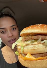 Enjoying a Loaded Big Mac from McDonald's