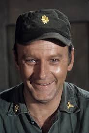 Captain greets Major Burns with a salute