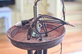 Most chandeliers are too heavy to fit into the standard electrical boxes, which usually have a load rating of 50 pounds. Rewiring A Chandelier At Charlotte S House