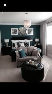This master bedroom with teal decor and furniture pieces looks beautiful and inviting. 20 Teal And Grey Bedroom Magzhouse