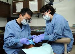 Lt Philip Park From Tacoma Wash Conducts A Tooth Filling Procedure With Hospital Corpsman Amber Brace From Fort Worth Emergency Dentist Dentist Dentistry