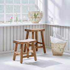 Perfect for a party, the garden, patio, or bathroom, this sturdy stool is built from natural teak. Rustic Teak Stool Charles Teak Stool Sika Design Eu