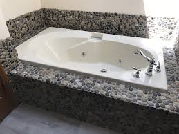 Designer mark zancanaro paired the floor with slate and tumbled marble shower walls for a cohesive look. Bathroom Remodeling Indianapolis High Quality Renovations