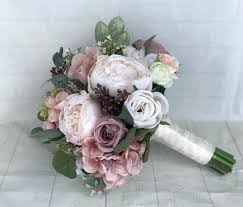 Wedding bouquets can be made from different types of flowers, and you can choose a bouquet designed with silk rose flowers, decorations such as crystals, pearls, paper, decorative details and materials. Wedding Bouquet Dusty Rose Bridal Bouquet Blush Wedding Flowers Peony Bouquet Mauve Dusty Rose Wedding Flowers Silk Bridal Bouquet From Shirleywedding 37 76 Dhgate Com