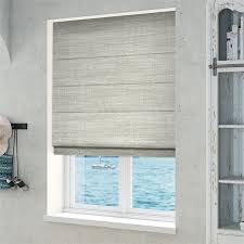Coordinate modern and creative patterns to complement monochromatic roman shades give a bold window treatment some contemporary style. Nice Cool Grey Roman Blind