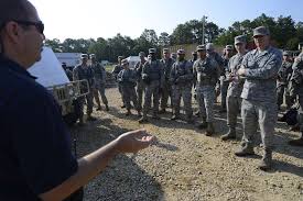 Dean Denmark, left, an emergency management coordinator