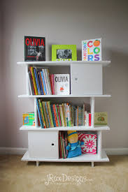 Shelves and stylish cubbies provide ample space for books, toys, and other treasured items. Knock Off Oeuf Mini Library Jroxdesigns