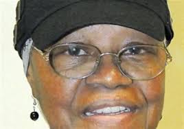 Kitchen volunteer, Roberta Hall, feeds souls