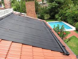 While it won't heat your inground or above ground pool as much as a traditional electric or gas heater will, any type of solar pool cover will keep more heat—and more water—in your pool. The Latest Products In Solar Power Solar Pool Heating Solar Water Heating Pool Solar Panels