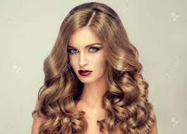 Beautiful model with long, dense and curly hairstyle. Beautiful Girl With Long Wavy Hair Fair Haired Model With Stock Photo Picture And Royalty Free Image Image 58149256