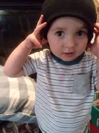 What is the purpose of a criss-cross stack of corrugated pipes wrapped in  plastic netting in a lake?