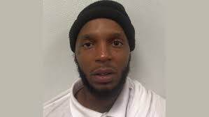 A Birmingham murder suspect was taken into custody Thursday after a police  chase that ended with the suspect stopping traffic as he dashed across all  lanes of traffic