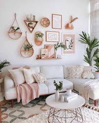 Popular house decor includes tapestries, lots of plants, macramé plant holders, salt lamps, and any diy projects; 18 Tips For Creating A Boho Style Home