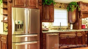 Line the scribe molding section up exactly where it will go on the wall. Coffee Cherry Pre Assembled Kitchen Cabinets