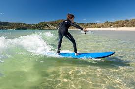 Noosa Couldnt Of Been More Perfect For Their First Surfing Lessons The Waves Are Gentle Enough And The Water Only Waste D Family Travel Surfing Learn To Surf