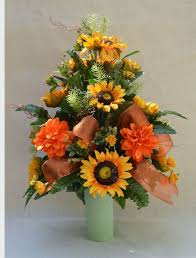 Yellow, purple, lavender, cemetery arrangement. Image Result For Flower Arrangements For Graves Fall Flower Arrangements Cemetery Flowers Flower Arrangements