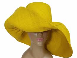 Something For When You Are Ready To Make A Statement A Hand Woven Raffia Sun Hat Crafted In Madagascar They Make Great H Raffia Hat Raffia Sun Hat Yellow Hat
