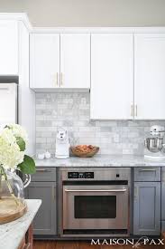 35 two tone kitchen cabinets to reinspire your favorite spot in the house | kitchen design ideas & remodel pictures | pinterest | two tone kitchen cabinets,. Two Toned Gray And White Cabinets Marble Subway Tile Carrara Countertops A Big Farmhouse Sink And Kitchen Cabinet Design Kitchen Renovation Kitchen Design
