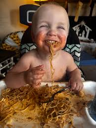 Skyline minus cheese enjoyed by toddler in Indy