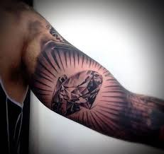 The shape of this part itself suggests that the tattoo design placed here should be either small to fit completely on the approximately the single surface, not falling off the curves, or it should be some oblong drawing. The 105 Best Inner Bicep Tattoos For Men Improb