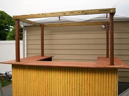 Enjoy doctor tiki's cocktail prescriptions, johnny johnny's bartending tomfoolery, and lala's hypnotic hula. How To Build A Tiki Bar With A Thatched Roof Hgtv