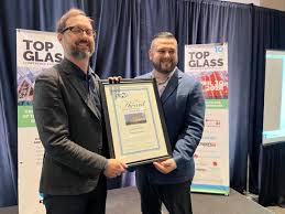 Top Glass completes first decade