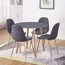 Featuring clean lines, this table is easy on the eyes with its roughhewn wood surface and natural textures that add stylish charm. Goldfan Round Dining Table And 4 Chairs Wood Style Kitchen Table And Fabric Chairs Dining Room Set 90cm All Grey 4 Buy Online In Aruba At Aruba Desertcart Com Productid 167410929