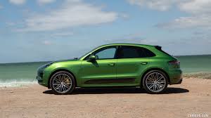 Maybe you would like to learn more about one of these? 2020 Porsche Macan Turbo Color Mamba Green Metallic Side Caricos