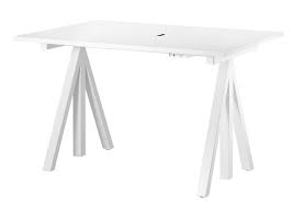 We started with standing desks. Height Adjustable Work Desks String Furniture