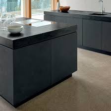 Look stone tiles like granite or slate to match your corian counters. Corian Countertop Carbon Aggregate Corian Commercial Kitchen Bathroom
