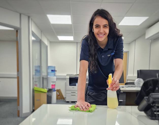 Mottingham Office Care crew performing workstation sanitization