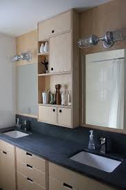Hhis And Hers Bathroom Love The Storage Cab Between The Mirrors Different Lights However Bathroom Cabinets Designs Plywood Kitchen Bathroom Cabinets