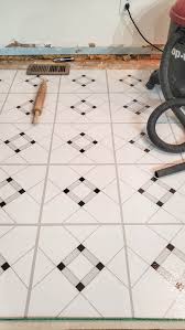 To create a designer look for the attic playroom that won't date, marbled black and white tiles were laid in a chequerboard pattern. How To Install Peel And Stick Vinyl Tile Nelliebellie