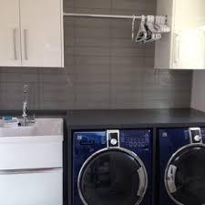 utility sink and flat panel cabinets