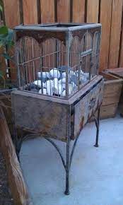 Maybe you would like to learn more about one of these? Antique Bird Cage Fire Pit Antique Bird Cages Bird Cage Decor