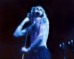 Layne staley tattoo layne staley photo thread. Layne Staley On Stage Holding The Mic Blue Light Long Hair Shoulder Tattoo Goatee