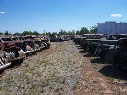 A Row Of Coupes At The Oliver Jordon Collection In Enid Okla To Be Offered For Auction By Vanderbrink Auctions Ll Cars Trucks Antique Trucks Wrecking Yards