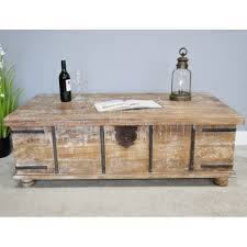 Consider positioning a long coffee table directly in front of the sofa. Large Trunk Coffee Table Wooden Coffee Table Storage Trunk