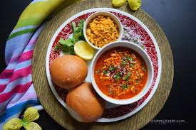 The spicy gravy called misal, made with moth beans is served with pav buns. Misal Misal Pav Recipe A Happy Treat