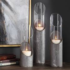 Our pillar candle holders are just what you need to pull your decorative arrangements together. Uttermost Karter Candle Holder Glass Candleholders Iron Candlesticks Glass Candle