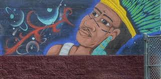 Decades-old Holly neighborhood mural restored to iconic status by original  artists